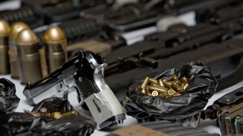 Guns and munitions confiscated to alleged Mexican drug dealers Alberto Sanchez Hinojosa aka "El Tony", Francisco Arteaga Espino and Leonel Cruz Hernandez are displayed to the press in Mexico City on September 7, 2008, after they were detained in Villahermosa, Tabasco state. Sanchez Hinojosa is one of the leaders of the Gulf Cartel. AFP PHOTO/Omar Torres (Photo credit should read OMAR TORRES/AFP via Getty Images)