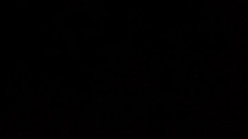 Arcangel y Anuel AA, cantantes de género urbano.