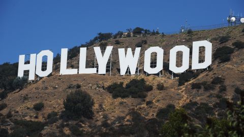 A view of the Hollywood sign from a street in a residential Hollywood Hills section of Hollywood, California, 21 September 2011. It is one of the world's most iconic sights, but for local residents, the huge "Hollywood" sign on their hillside overlooking Los Angeles is a source of growing anger. AFP PHOTO / ROBYN BECK (Photo by Robyn BECK / AFP) (Photo by ROBYN BECK/AFP via Getty Images)