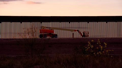 A mechanical lift sits next to a section of newly constructed border wall in Hidalgo, Texas on January 11, 2021. - Chad Wolf, the acting secretary of the Department of Homeland Security, announced he was resigning January 11 as worries rose over more violence during President-elect Joe Biden's inauguration next week. Wolf's resignation came a day before Trump is to travel to the US-Mexico frontier near Alamo, Texas to inspect the border wall he has had built. (Photo by Mark Felix / AFP) (Photo by MARK FELIX/AFP /AFP via Getty Images)