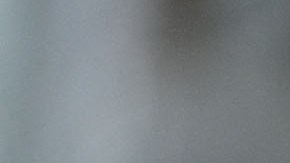 A school administrator confirms student health check data on a laptop computer as students and parents wait in line to enter school grounds on the first day of the school year at Grant Elementary School, in Los Angeles, California on August 16, 2021. - To stem the spread of Covid-19 coronavirus teachers in Los Angeles are required to be fully vaccinated against Covid-19 by October 15 and both teachers and students are required to wear masks inside school buildings. Issues wih the new "Daily Pass" health check app caused confusion and long lines on the first day back to school. (Photo by Robyn Beck / AFP) (Photo by ROBYN BECK/AFP via Getty Images)