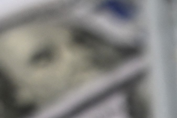 A picture taken on December 7, 2021 in Istanbul shows US dollars banknotes. (Photo by Ozan KOSE / AFP) (Photo by OZAN KOSE/AFP via Getty Images)