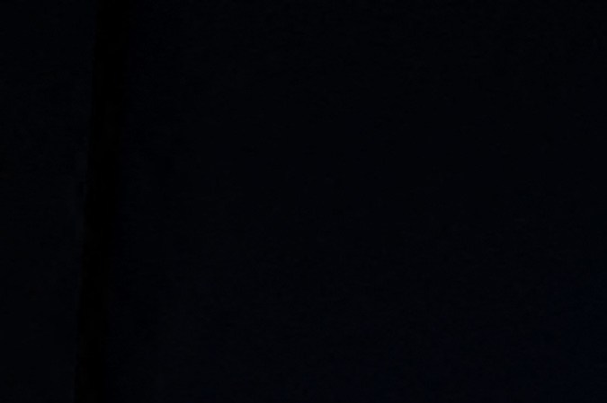 A photo shows the logo signs of Google and YouTube at their stand ahead of the World Economic Forum (WEF) annual meeting in Davos on May 22, 2022. (Photo by Fabrice COFFRINI / AFP) (Photo by FABRICE COFFRINI/AFP via Getty Images)