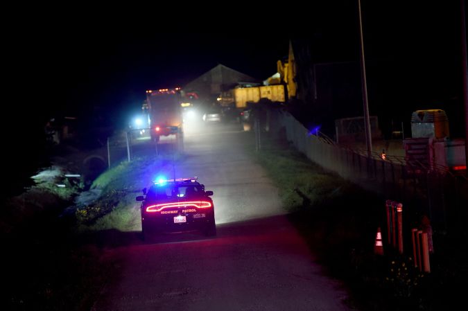 A Highway Patrol car is seen at the scene of a shooting at Cabrillo Highway in Half Moon Bay, California on January 23, 2023. - An Asian farm worker was in custody January 23, 2023 after seven of his colleagues were killed in front of children at sites in California, days after a mass shooter killed 11 people at a Lunar New Year celebration near Los Angeles. The latest bloodshed to hit Asian Americans in California occurred at two farms around Half Moon Bay, a coastal community near San Francisco. (Photo by Susana BATES / AFP) (Photo by SUSANA BATES/AFP via Getty Images)