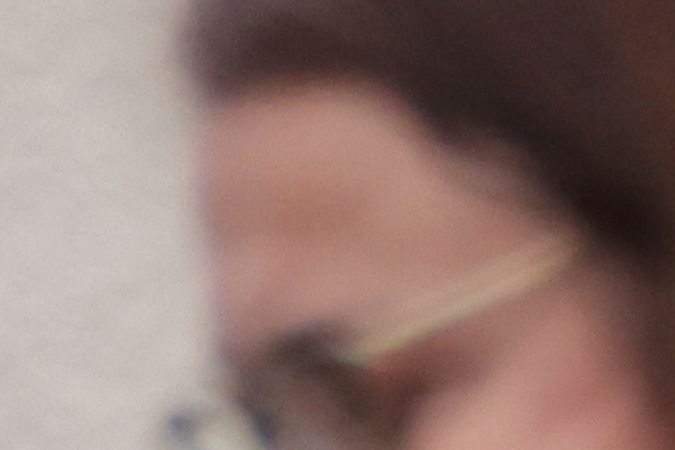 Lindsay Toczylowski (C), executive director of Immigrant Defenders Law Center, listens to a speaker outside St. Anthony Croatian Catholic Church where migrants have been transported in Los Angeles, June 14, 2023. A busload of 42 migrants including 8 children, had arrived at Union Station in Los Angeles from Texas as claimed by Governor Greg Abbott Wednesday, June 14, 2023. (Photo by DAVID SWANSON / AFP) (Photo by DAVID SWANSON/AFP via Getty Images)