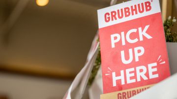 HOUSTON, TEXAS - JULY 07: A Grubhub sign is seen in a Bubble Egg restaurant on July 07, 2022 in Houston, Texas. As of Wednesday, the premium service, called Grubhub, became a free perk for Amazon Prime members. (Photo by Brandon Bell/Getty Images)