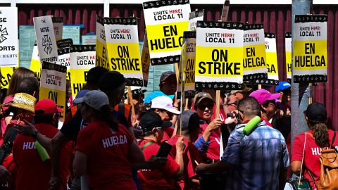 Striking Unite Here Local 11 workers from the W Hotel in Hollywood join striking members of the Writers Guild of America for a march in Hollywood, California, on July 21, 2023. The hotel-worker strike joins a series of recent walkouts against Los Angeles-area hotels as Hollywood writers and actors strike also continues. (Photo by Frederic J. BROWN / AFP) (Photo by FREDERIC J. BROWN/AFP via Getty Images)