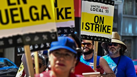 Striking Unite Here Local 11 workers from the W Hotel in Hollywood join striking members of the Writers Guild of America for a march in Hollywood, California, on July 21, 2023. The hotel-worker strike joins a series of recent walkouts against Los Angeles-area hotels as Hollywood writers and actors strike also continues. (Photo by Frederic J. BROWN / AFP) (Photo by FREDERIC J. BROWN/AFP via Getty Images)