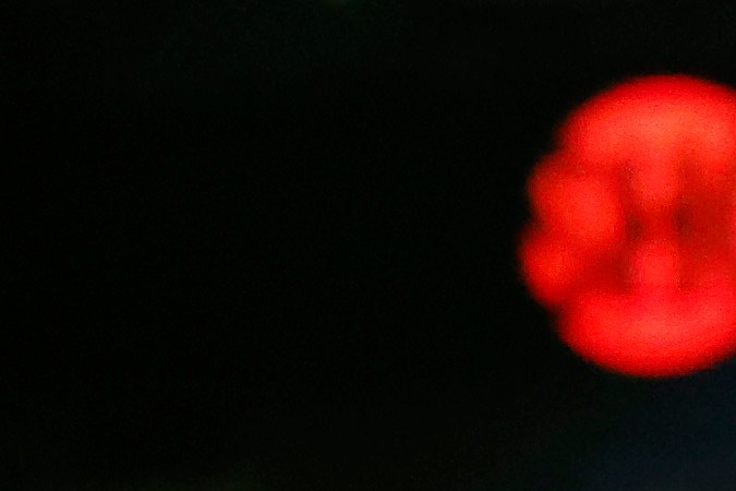 LAS VEGAS, NEVADA - SEPTEMBER 30:   Saul "Canelo" Alvarez of Mexico (purple/gold trunks) is attended to between rounds of a super middleweight title fight against Jermell Charlo ( black trunks) at T-Mobile Arena on September 30, 2023 in Las Vegas, Nevada.  (Photo by Sarah Stier/Getty Images)