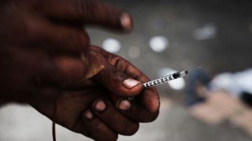 NEW YORK, NY - OCTOBER 06: A heroin user displays a needle in a South Bronx neighborhood which has the highest rate of heroin-involved overdose deaths in the city on October 6, 2017 in New York City. Like Staten Island, parts of the Bronx are experiencing an epidemic in drug use, especially heroin and other opioid based drugs. More than 1,370 New Yorkers died from overdoses in 2016, the majority of those deaths involved opioids. According to the Deputy Attorney General, drug overdoses are now the leading cause of death for Americans under the age of 50. (Photo by Spencer Platt/Getty Images)