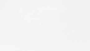 Tustin (United States), 07/11/2023.- A person looks out at a historic World War II-era wooden hangar as it burns in Tustin, California, USA, 07 November 2023. The structure caught fire on 07 November morning and the Orange County Fire Authority stated that the only way to fight the fire was to let the structure to collapse. The hanger was one of two built in 1942 for the US Navy, and were among the the largest wooden structures ever built. EFE/EPA/CAROLINE BREHMAN