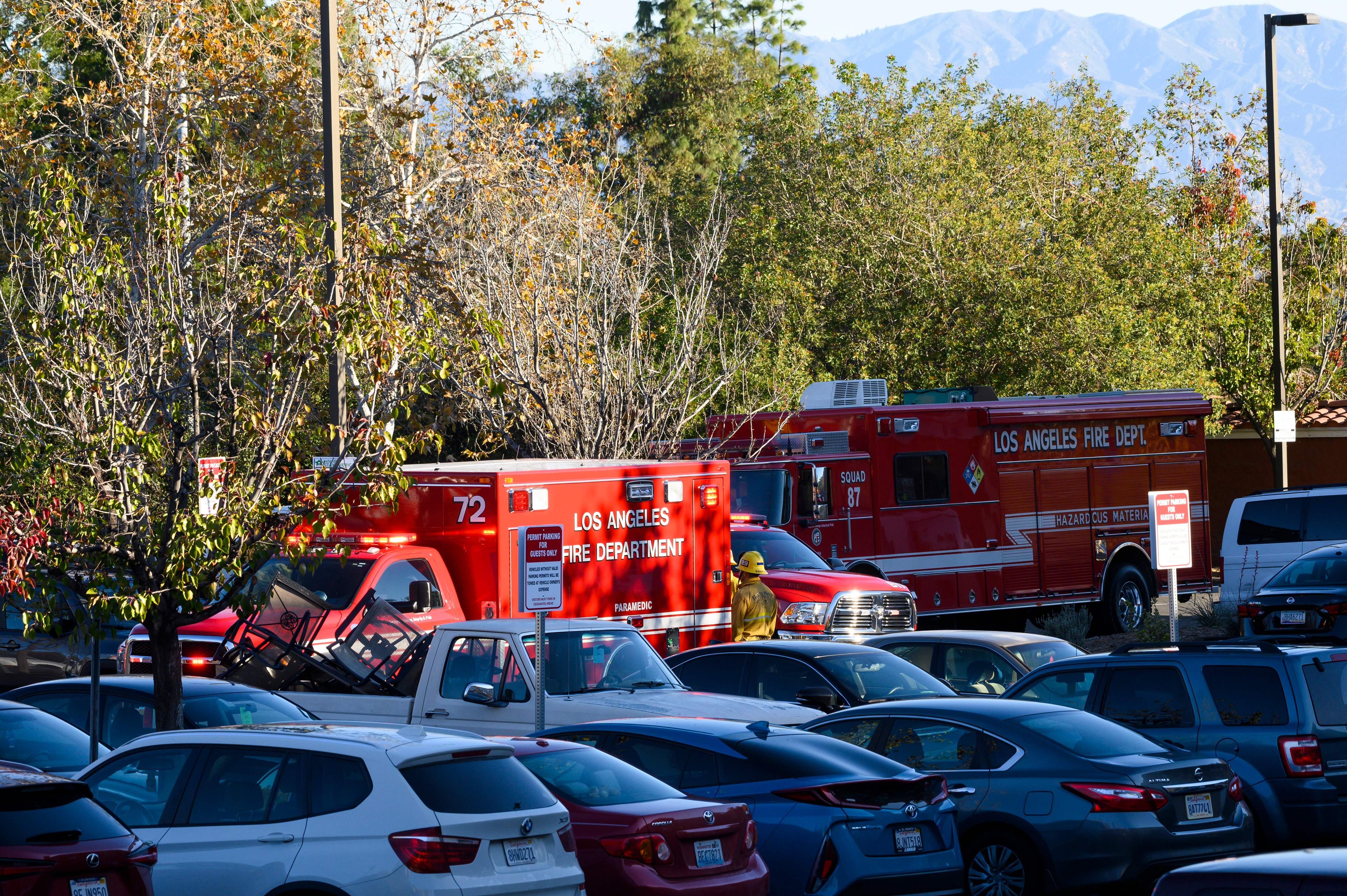 Fire and hazmat personnel investigate after four people were take to the hospital with possible fentanyl exposure, at a hotel in the Woodland Hills neighborhood of Los Angeles, California, December 31, 2019. - Authorities said one victim was in grave condition and three others in fair but stable condition. (Photo by Robyn Beck / AFP) (Photo by ROBYN BECK/AFP via Getty Images)
