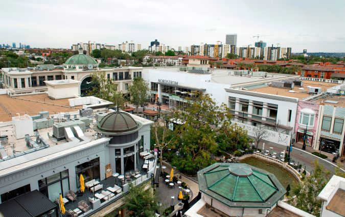 View of a deserted outdoor mall The Grove during the Covid 19 crisis on April 7, 2020, In Los Angeles. (Photo by VALERIE MACON / AFP) (Photo by VALERIE MACON/AFP via Getty Images)