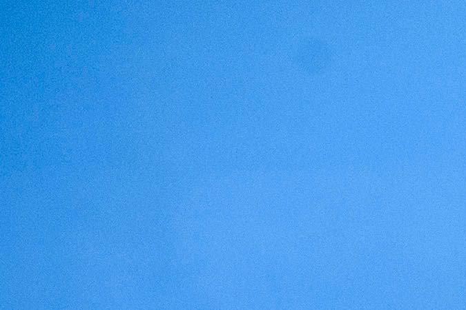 A YMCA staff member assists a child as they attend online classes at a learning hub inside the Crenshaw Family YMCA during the Covid-19 pandemic on February 17, 2021 in Los Angeles, California. - While many area schools remain closed for in-person classes, the learning hub program provides structured distance education resources including free WiFi, electricity, staff support, academic tutoring, and recreation activities to provide a safe environment to support low income and minority communities. (Photo by Patrick T. FALLON / AFP) (Photo by PATRICK T. FALLON/AFP via Getty Images)