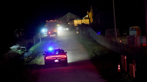 A Highway Patrol car is seen at the scene of a shooting at Cabrillo Highway in Half Moon Bay, California on January 23, 2023. - An Asian farm worker was in custody January 23, 2023 after seven of his colleagues were killed in front of children at sites in California, days after a mass shooter killed 11 people at a Lunar New Year celebration near Los Angeles. The latest bloodshed to hit Asian Americans in California occurred at two farms around Half Moon Bay, a coastal community near San Francisco. (Photo by Susana BATES / AFP) (Photo by SUSANA BATES/AFP via Getty Images)