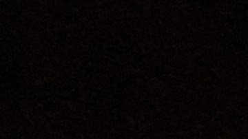 Dasling Sanchez, 28, holds her sleeping sons as they rest next to a gas station in downtown Brownsville, Texas, on May 6, 2023. Sanchez is waiting for her brother, who lives in Los Angeles, California, to buy them bus tickets to continue their trip into the US to meet him. - Migrants crossed the Rio Grande and surrendered to Customs and Border Patrol agents a few days ago. Then they were taken to a detention center and released on American soil, where they are free to remain while a migration judge reviews their cases. Some of them are waiting for another relative to be released to continue on their way, and others are waiting for a relative that lives in the United States to buy their tickets to continue their trips. Humanitarian organizations say that there was an important increase in migrants in the last month, from 200 to 700 daily, because they are afraid that after the end of Title 42, they could be deported to their original countries or banned to enter the US for several years. (Photo by Moisés ÁVILA / AFP) (Photo by MOISES AVILA/AFP via Getty Images)