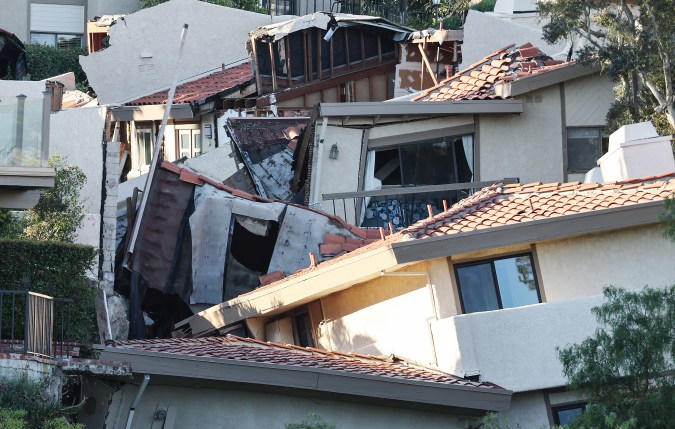ROLLING HILLS ESTATES, CALIFORNIA - JULY 11: A view of upscale homes destroyed by a landslide on Palos Verdes Peninsula on July 11, 2023 in Rolling Hills Estates, California. The still unexplained landslide destroyed 12 homes over the weekend and has sent ten of the homes slowly sliding toward a canyon below, forcing the City Council to declare a local state of emergency. (Photo by Mario Tama/Getty Images)