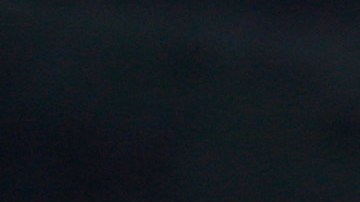 A California Highway Patrol officer checks the identifications of residents being allowing to pass through a roadblock on Highway 38 toward the Big Bear Lake, California as a standoff with the former Los Angeles police officer who is now-quadruple murder suspect Christopher Dorner continues, near San Bernardino, California February 12, 2013, some 46 miles (75 km) from the San Bernardino Mountains near Big Bear, California where Dorner, a former US cop, has barricaded himself in a cabin and exchanged gunfire with police who have the cabin surrounded. AFP PHOTO / David McNew (Photo credit should read DAVID MCNEW/AFP via Getty Images)