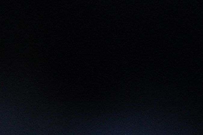 A California Highway Patrol officer guards a roadblock on Highway 38 near Big Bear Lake, California, on February 13, 2013 during a standoff with the former Los Angeles police officer Christopher Dorner. Authorities on Wednesday examined human remains found in a burned out mountain cabin to determine whether they belong to Dorner, a fugitive ex-cop wanted in at least four murders. Police discovered the remains in the cabin's charred ruins after a chase ended in a shootout with police and fire near Big Bear in the snow covered mountains east of Los Angeles where Dorner was thought to have taken refuge. AFP PHOTOS /AFP PHOTO/JOE KLAMAR (Photo credit should read JOE KLAMAR/AFP via Getty Images)