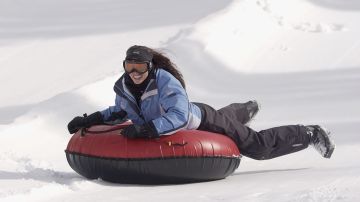 TELLURIDE, CO - JANUARY 11: Actress Shannon Elizabeth goes tubing at CuervoNation Snow Fest at Telluride Ski Resort on January 11, 2003 in Telluride, Colorado. (Photo by Ezra Shaw/Getty Images)