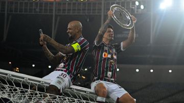 Felipe Melo y Germán Cano celebran la Copa Libertadores en el Maracaná.