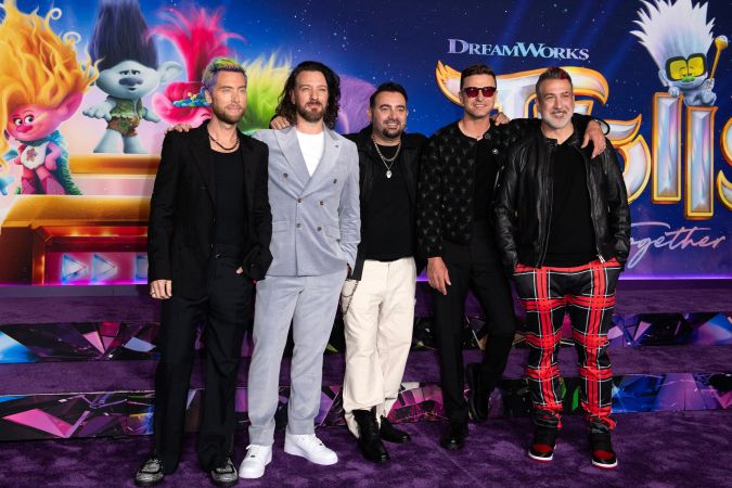 (From L) US singers Lance Bass, JC Chasez, Chris Kirkpatrick, Justin Timberlake, and Joey Fatone of boy band NSYNC arrive for the premiere of "Trolls: Band Together" at the TCL Chinese Theater in Hollywood, California, on November 15, 2023. (Photo by VALERIE MACON / AFP) (Photo by VALERIE MACON/AFP via Getty Images)