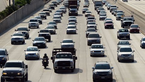 Motorists make their way out of downtown Los Angeles headed east on the Interstate 10 freeway on August 30, 2013 in California, where more Southern California residents are taking Labor Day weekend trips this year compared to in 2012, according to the Automobile Club of Southern California. Some 2.44 million residents have plans for a trip of at least 50 miles from home this Labour Day weekend, with about 1.93 million expected to drive, up 6.2 percent from 1.82 million last year, according to the Auto Club. AFP PHOTO/Frederic J. BROWN (Photo credit should read FREDERIC J. BROWN/AFP via Getty Images)