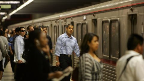 LOS ANGELES, CA - JUNE 3: Passengers board Metro Rail subway trains during rush hour June 3, 2008 in Los Angeles, California. Skyrocketing gas prices are driving more commuters to take trains and buses to work instead of their cars. In the first three months of 2008, the number of trips taken on public transport in the US rose 3 percent to 2.6 billion, creating pressures on some transportation systems to cope with increasing ridership. Transit officials in southern California and elsewhere are now encouraging employers to stagger employee schedules to ease the rush hour crunch on trains and buses and Metrolink plans to add 107 rail cars to its fleet of 155 as soon as next year. (Photo by David McNew/Getty Images)