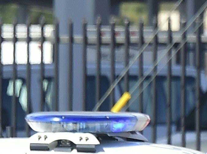 Police man an intersection May 11, 2018 following reports of shooting at Highland High School in Palmdale, 40 miles (65 kilometers) north of downtown Los Angeles. - Police arrested a man after reports of shootings at two schools near Los Angeles, the local sheriff's department and education officials said. The Los Angeles County Sheriff said one suspect had been detained "regarding the person with a gun" at Highland High School. Local news reports had earlier said that at least one person had been wounded. It was not immediately clear what type of weapon the man had. (Photo by Frederic J. BROWN / AFP) (Photo credit should read FREDERIC J. BROWN/AFP via Getty Images)