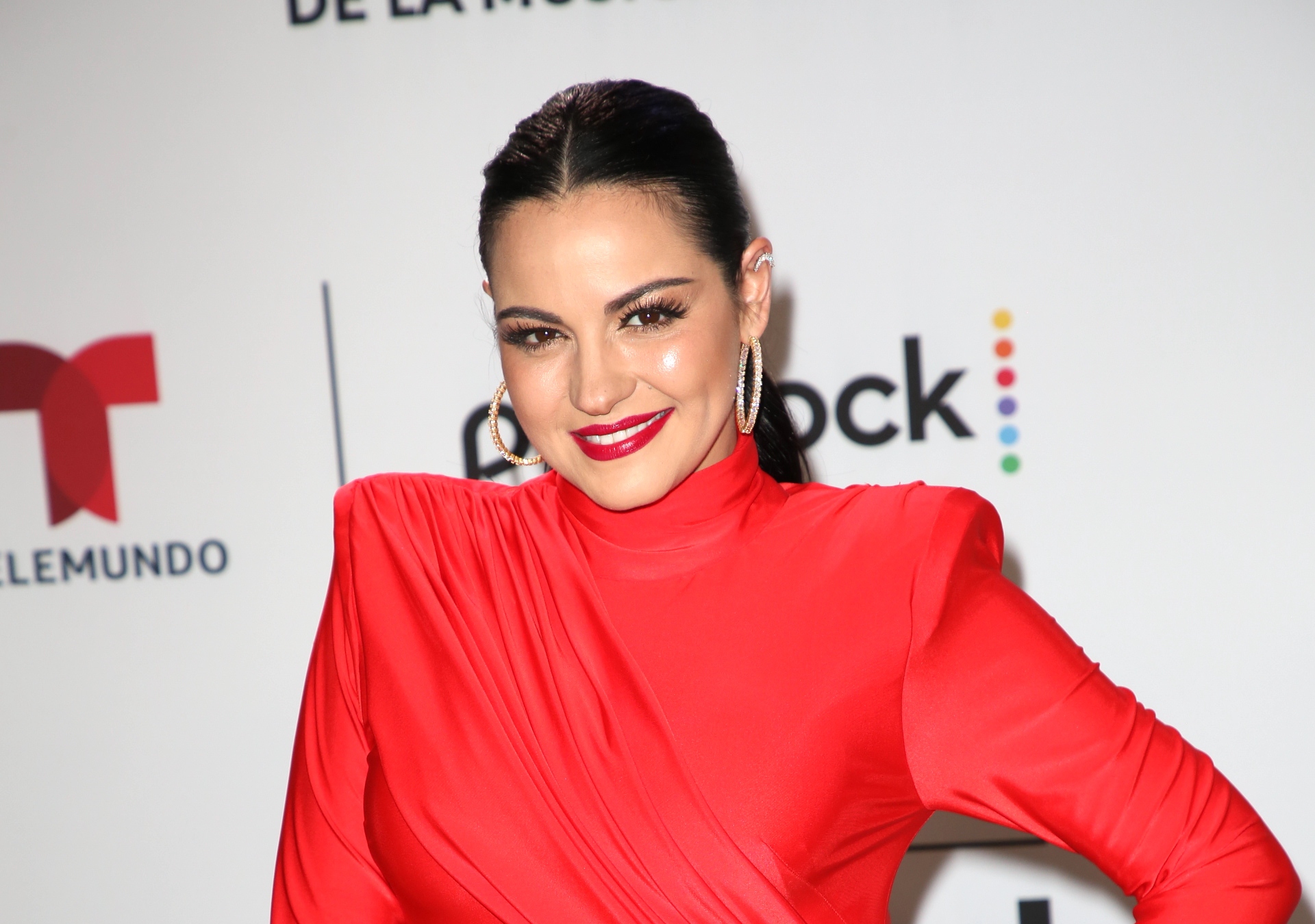 Maite Perroni brings out her sensual side and poses in a swimsuit next ...
