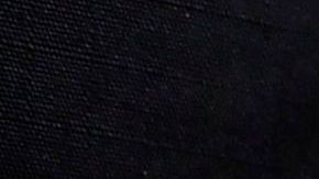 A Los Angeles Police Department officer displays recovered guns from residents turning in firearms at a "Gun Buy Back" event taking place in three locations across Los Angeles, California on December 5, 2020. - The "Gun Buy Back" program is used by the LAPD to help reduce gun violence, improve security in communities and those participating can anonymously turn in firearms in exhange for giftcards valued at $100 for handguns, shotguns and rifles and $200 for assault weapons, as classified by the state of California. (Photo by Frederic J. BROWN / AFP) (Photo by FREDERIC J. BROWN/AFP via Getty Images)