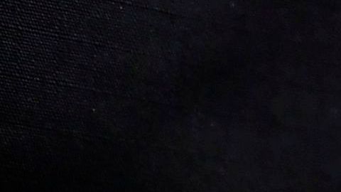 A Los Angeles Police Department officer displays recovered guns from residents turning in firearms at a "Gun Buy Back" event taking place in three locations across Los Angeles, California on December 5, 2020. - The "Gun Buy Back" program is used by the LAPD to help reduce gun violence, improve security in communities and those participating can anonymously turn in firearms in exhange for giftcards valued at $100 for handguns, shotguns and rifles and $200 for assault weapons, as classified by the state of California. (Photo by Frederic J. BROWN / AFP) (Photo by FREDERIC J. BROWN/AFP via Getty Images)