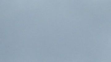 A storm cloud hovers over Los Angeles, California on December 13, 2021. A storm which has already hit Northern California makes its way south and is expected to bring heavy rain and snow to the mountains of Southern California, raising concern of midslides in fire-ravaged areas. (Photo by Frederic J. BROWN / AFP) (Photo by FREDERIC J. BROWN/AFP via Getty Images)