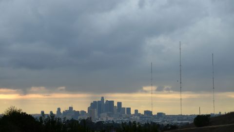 A storm cloud hovers over Los Angeles, California on December 13, 2021. A storm which has already hit Northern California makes its way south and is expected to bring heavy rain and snow to the mountains of Southern California, raising concern of midslides in fire-ravaged areas. (Photo by Frederic J. BROWN / AFP) (Photo by FREDERIC J. BROWN/AFP via Getty Images)