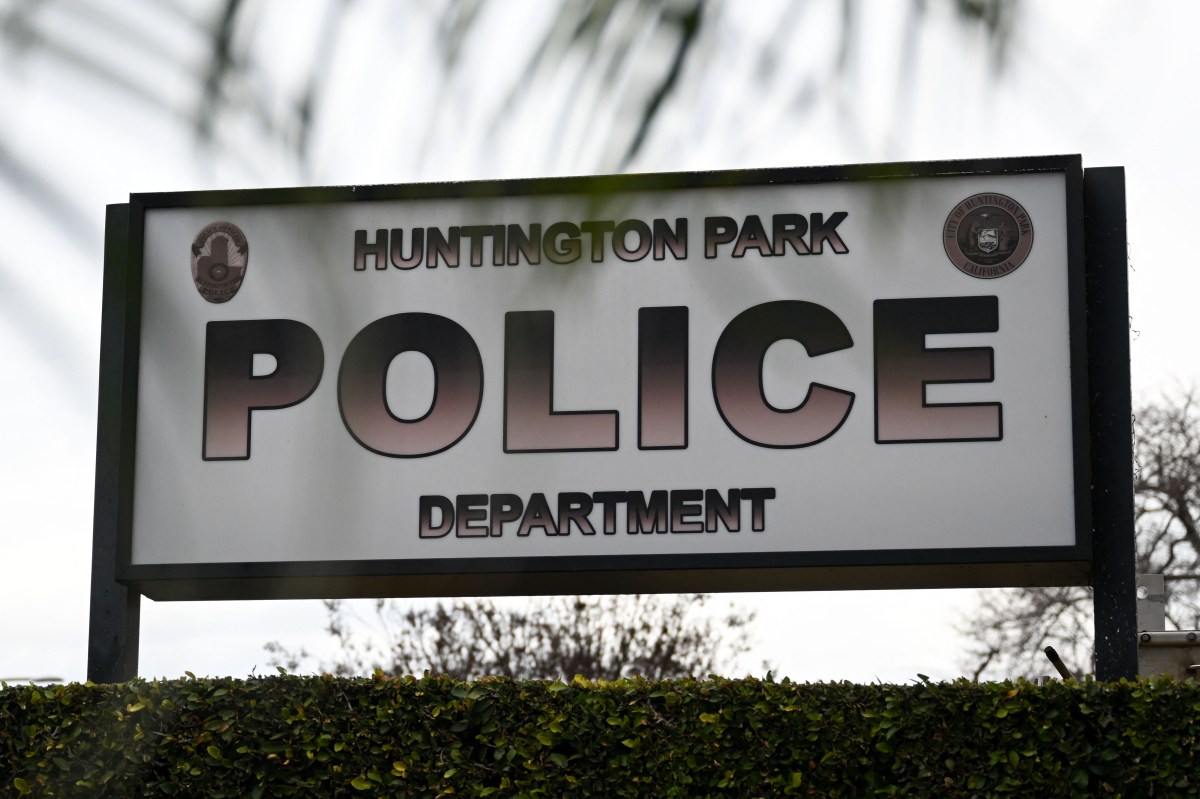 Signage is displayed outside the Huntington Park Police Department, where family and friends of Anthony Lowe hold a news conference to demand an investigation into his death outside of the Huntington Park Police Department in Huntington Park, California, on January 30, 2023. - Lowe was reportedly in a wheelchair with both legs amputated at the knees and undergoing a mental health crisis when he was shot to death by Huntington Park police on January 26, 2023. (Photo by Patrick T. FALLON / AFP) (Photo by PATRICK T. FALLON/AFP via Getty Images)