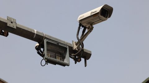 A closed-circuit television (CCTV) camera is pictured in a street in Tehran on April 10, 2023. - Police in Iran said on April 8 they plan to use "smart" technology in public places to identify and then penalise women who violate the country's strict Islamic dress code. A statement said the force would "take action to identify norm-breaking people by using tools and smart cameras in public places and thoroughfares". (Photo by ATTA KENARE / AFP) (Photo by ATTA KENARE/AFP via Getty Images)