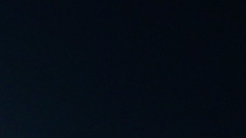 Sergio "Checo" Pérez conversando con Helmut Marko y Christian Horner en Abu Dhabi.