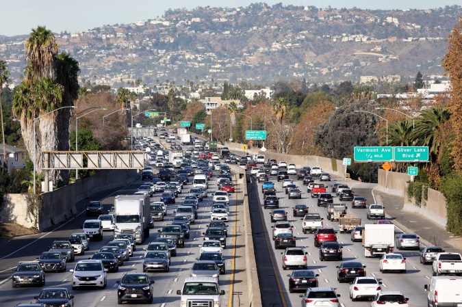 LOS ANGELES, CALIFORNIA - NOVEMBER 23: Heavy traffic moves along the 101 freeway on Wednesday morning on November 23, 2022 in Los Angeles, California. The American Automobile Association (AAA) predicts nearly 55 million Americans will travel 50 miles or more for the Thanksgiving holiday weekend, 98 percent of pre-pandemic volumes. AAA also projects that nearly 49 million are expected to travel by vehicle this week, while around 4.5 million will fly to their Thanksgiving destinations. (Photo by Mario Tama/Getty Images)