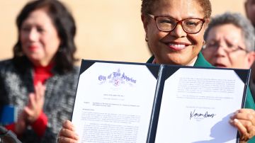 LOS ANGELES, CALIFORNIA - DECEMBER 16: Los Angeles Mayor Karen Bass displays the affordable housing executive directive she signed at the Lorena Plaza affordable housing project site on December 16, 2022 in Los Angeles, California. The directive aims to 'dramatically accelerate and lower the cost of building affordable housing and shelter in Los Angeles' amid a housing and homelessness crisis in the city. (Photo by Mario Tama/Getty Images)