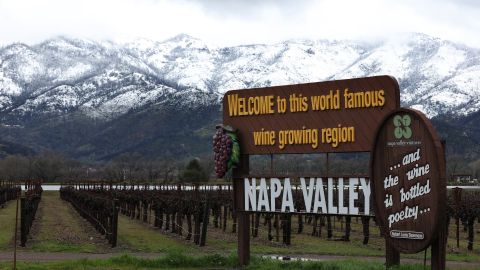 CALISTOGA, CALIFORNIA - FEBRUARY 24: Snow covers the hills behind a vineyard on February 24, 2023 in Calistoga, California. A large winter storm brought snow to lower elevations overnight in the Napa Valley. Much of California is being impacted by a cold winter storm that is bringing rain, wind a snow below 1,500 feet in many locations. (Photo by Justin Sullivan/Getty Images)