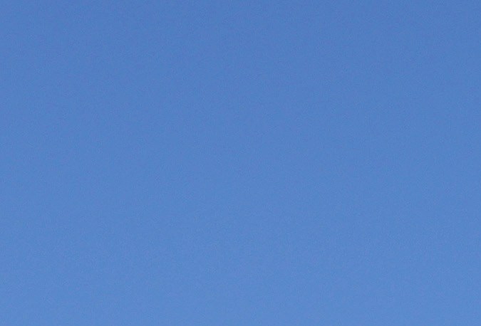 SAN FRANCISCO, CALIFORNIA - MARCH 24: San Francisco Department of Public Works (SFDPW) worker Chris Solorzano (R) uses a grading rake to smooth over asphalt as he repairs a pot hole on March 24, 2023 in San Francisco, California. After a dozen wet atmospheric river events have drenched the San Francisco Bay Area since the beginning of the year, crews are busy filling the thousands of pot holes that have emerged on streets and highways in and around. Pot holes develop when rainwater undermines the asphalt causing it to deteriorate. (Photo by Justin Sullivan/Getty Images)