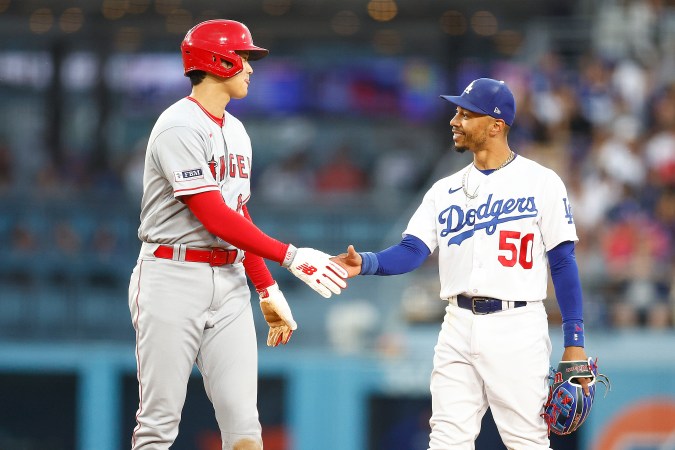 LOS ANGELES, CALIFORNIA - JULY 07: Mookie Betts #50 of the Los Angeles Dodgers and Shohei Ohtani #17 of the Los Angeles Angels in the fourth inning at Dodger Stadium on July 07, 2023 in Los Angeles, California. (Photo by Ronald Martinez/Getty Images)