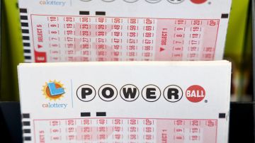LOS ANGELES, CALIFORNIA - JULY 18: Powerball play slips are displayed in a convenience store on July 18, 2023 in Los Angeles, California. The Powerball jackpot for the drawing on July 19th is now estimated to be $1 billion after three months of drawings without a winner. (Photo by Mario Tama/Getty Images)