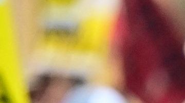 Hotel workers on strike hold placards calling on Taylor Swift to support their fight outside the InterContinental Hotel in downtown Los Angeles, California on August 7, 2023. Hundreds of hotel workers in Southern California walked off the job on Monday, demanding higher pay and better benefits. (Photo by Frederic J. BROWN / AFP) (Photo by FREDERIC J. BROWN/AFP via Getty Images)
