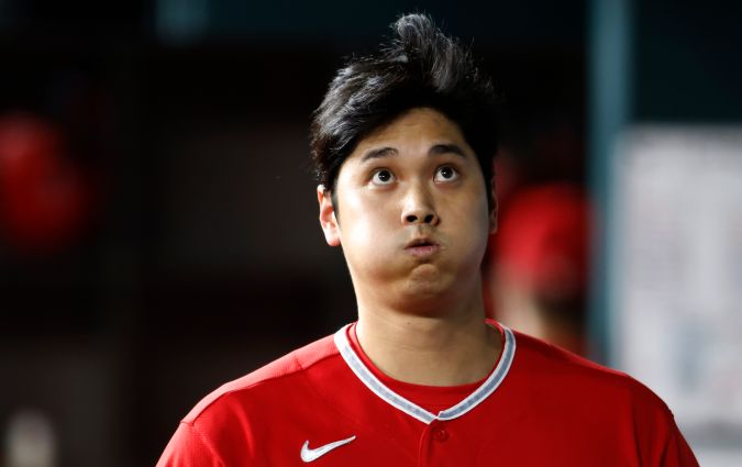 ARLINGTON, TX - AUGUST 14: Shohei Ohtani #17 of the Los Angeles Angels reacts after striking out against the Texas Rangers during the fourth inning at Globe Life Field on August 14, 2023 in Arlington, Texas. (Photo by Ron Jenkins/Getty Images)
