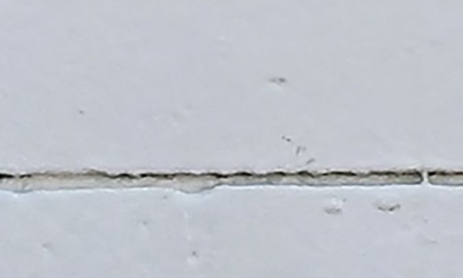 A woman sleeps on a sidewalk on August 16, 2023, in Los Angeles, California, where homelessness has seen a 10 percent surge compared to last year. A recent report from the Los Angeles Homeless Services Authority reveals an estimate of 42,260 people living on the streets of Los Angeles without shelter, as the homeless population has more than doubled over the past decade. (Photo by Frederic J. BROWN / AFP) (Photo by FREDERIC J. BROWN/AFP via Getty Images)