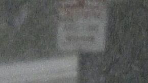 A vehicle splashes up water during heavy rains from Tropical Storm Hilary, in south Los Angeles, California, on August 20, 2023. Hurricane Hilary weakened to a tropical storm on August 20, 2023, as it barreled up Mexico's Pacific coast, but was still likely to bring life-threatening flooding to the typically arid southwestern United States, forecasters said. Authorities reported at least one fatality in northwestern Mexico, where Hilary lashed the Baja California Peninsula with heavy rain and strong winds. (Photo by Robyn BECK / AFP) (Photo by ROBYN BECK/AFP via Getty Images)