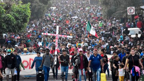 TOPSHOT - Migrants take part in a caravan towards the border with the United States in Tapachula, Chiapas State, Mexico, on December 24, 2023. Mexican President Andres Manuel Lopez Obrador on December 22 said that his government would step up efforts to contain irregular migration flows. Lopez Obrador said the "extraordinary" migration situation would be the focus of talks with Secretary of State Antony Blinken and other senior US officials in Mexico City on Wednesday. (Photo by AFP) (Photo by STR/AFP via Getty Images)