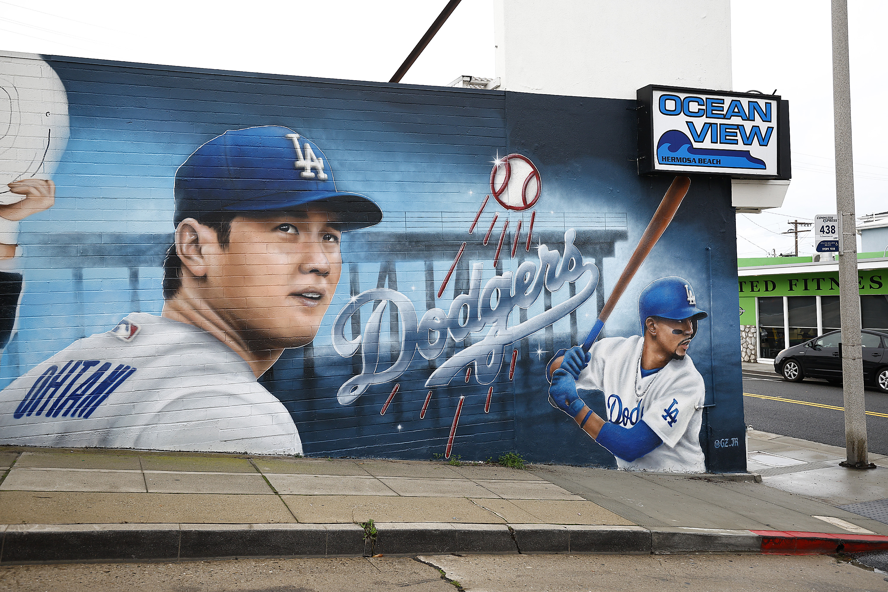 HERMOSA BEACH, CALIFORNIA - DECEMBER 21:  A mural of Shohei Ohtani of the Los Angeles Dodgers on the outside wall of Oceanview Liquor Store in Hermosa Beach on December 21, 2023.  The mural was completed by Gustavo Zermeno Jr in Hermosa Beach, California. (Photo by Ronald Martinez/Getty Images)