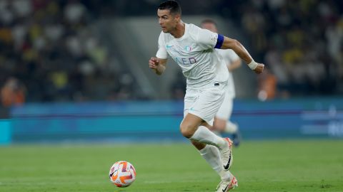 JEDDAH, SAUDI ARABIA - DECEMBER 26: Cristiano Ronaldo of Al Nassr runs with the ball during the Saudi Pro League match between Al-Ittihad and Al-Nassr at Prince Abdullah Al Faisal Stadium on December 26, 2023 in Jeddah, Saudi Arabia. (Photo by Yasser Bakhsh/Getty Images)